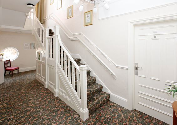 Stairs and hallway in Abbeyfield House, Colwyn Bay